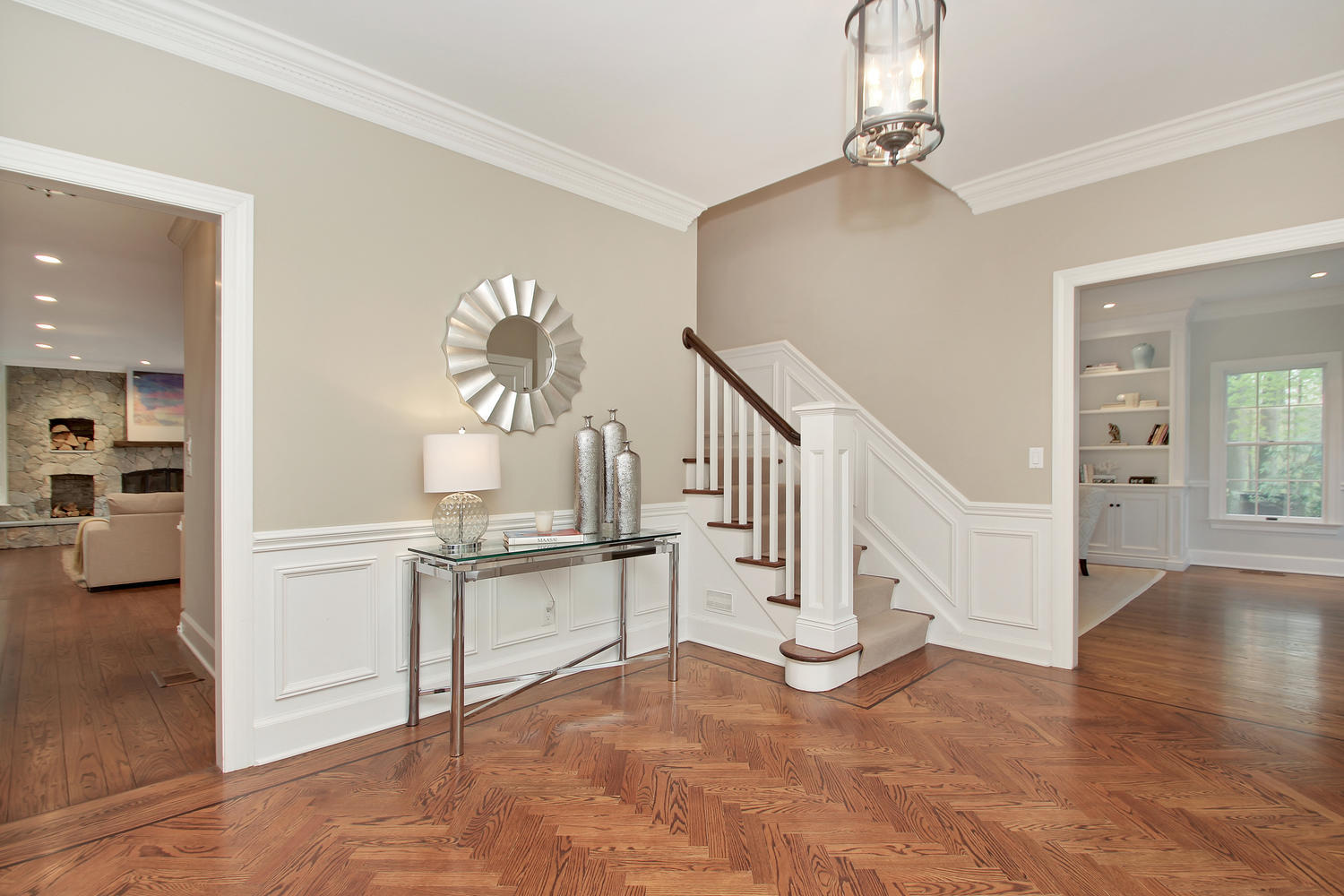 222 Marshall Ridge Road New Canaan, CT 06840 - Photo 4 of 49 a view of entryway and hall with wooden floor
