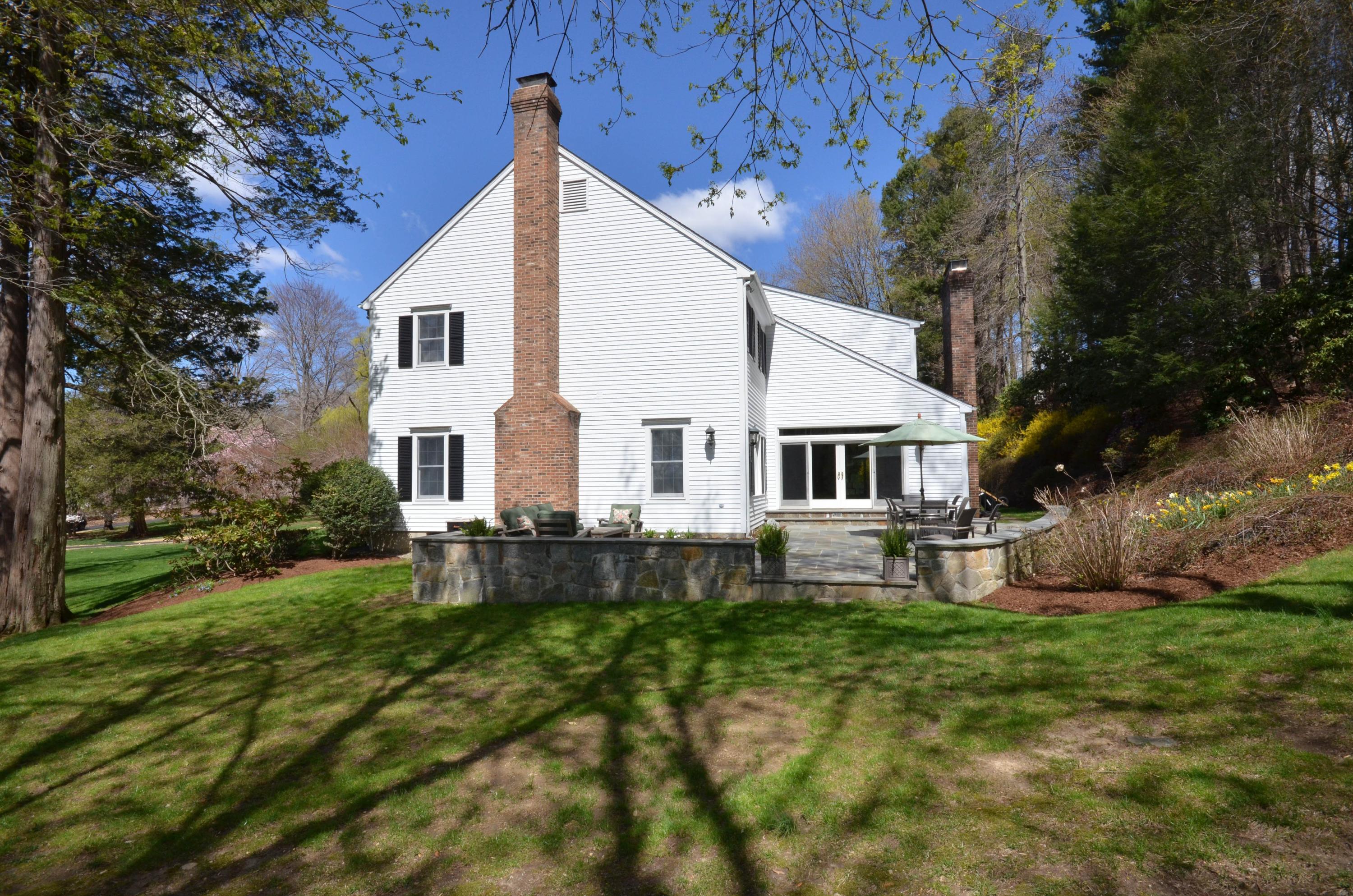 222 Marshall Ridge Road New Canaan, CT 06840 - Photo 43 of 49 a view of house with a yard