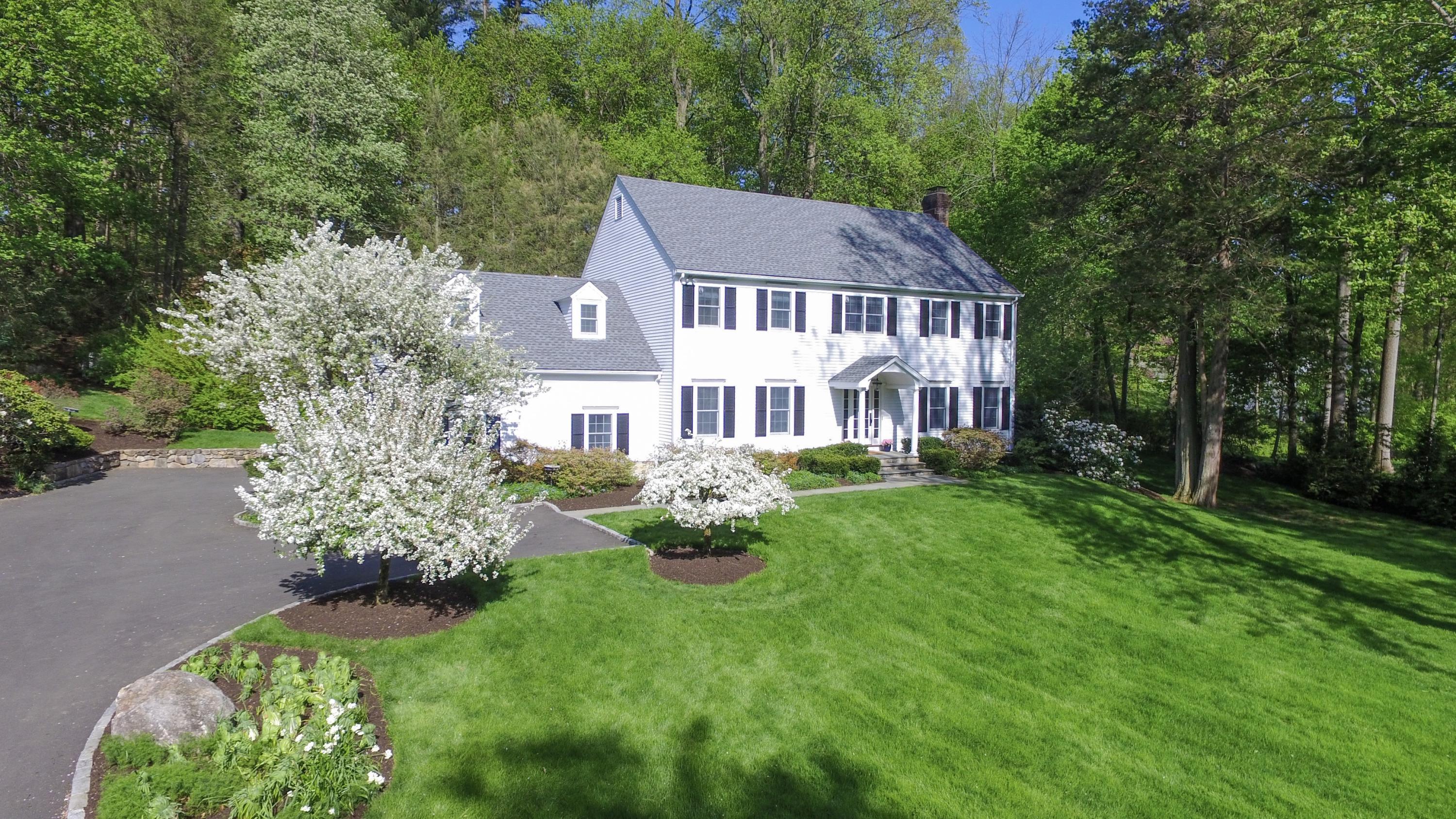 222 Marshall Ridge Road New Canaan, CT 06840 - Photo 45 of 49 a aerial view of a house with yard and green space