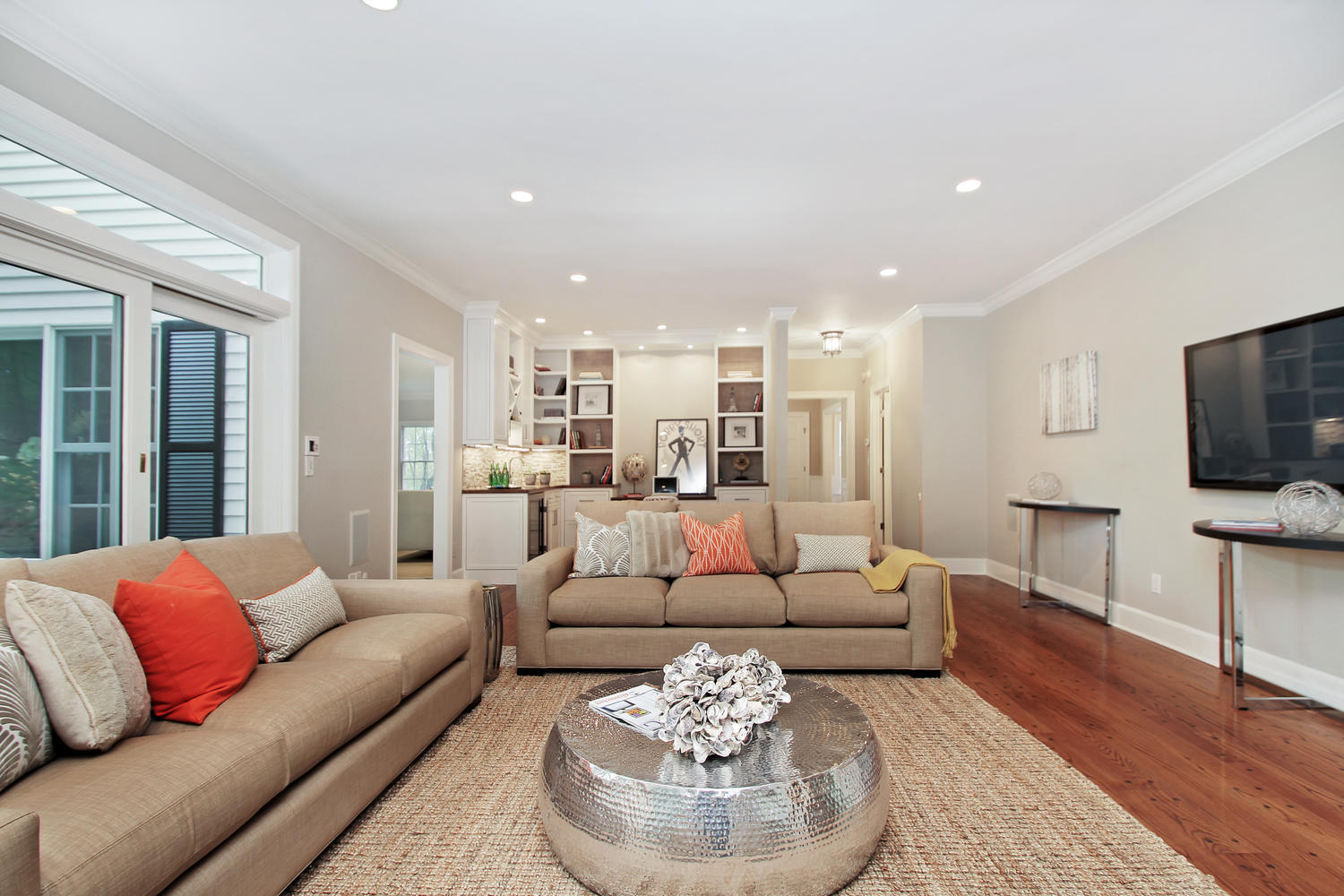 222 Marshall Ridge Road New Canaan, CT 06840 - Photo 7 of 49 a living room with furniture and a flat screen tv