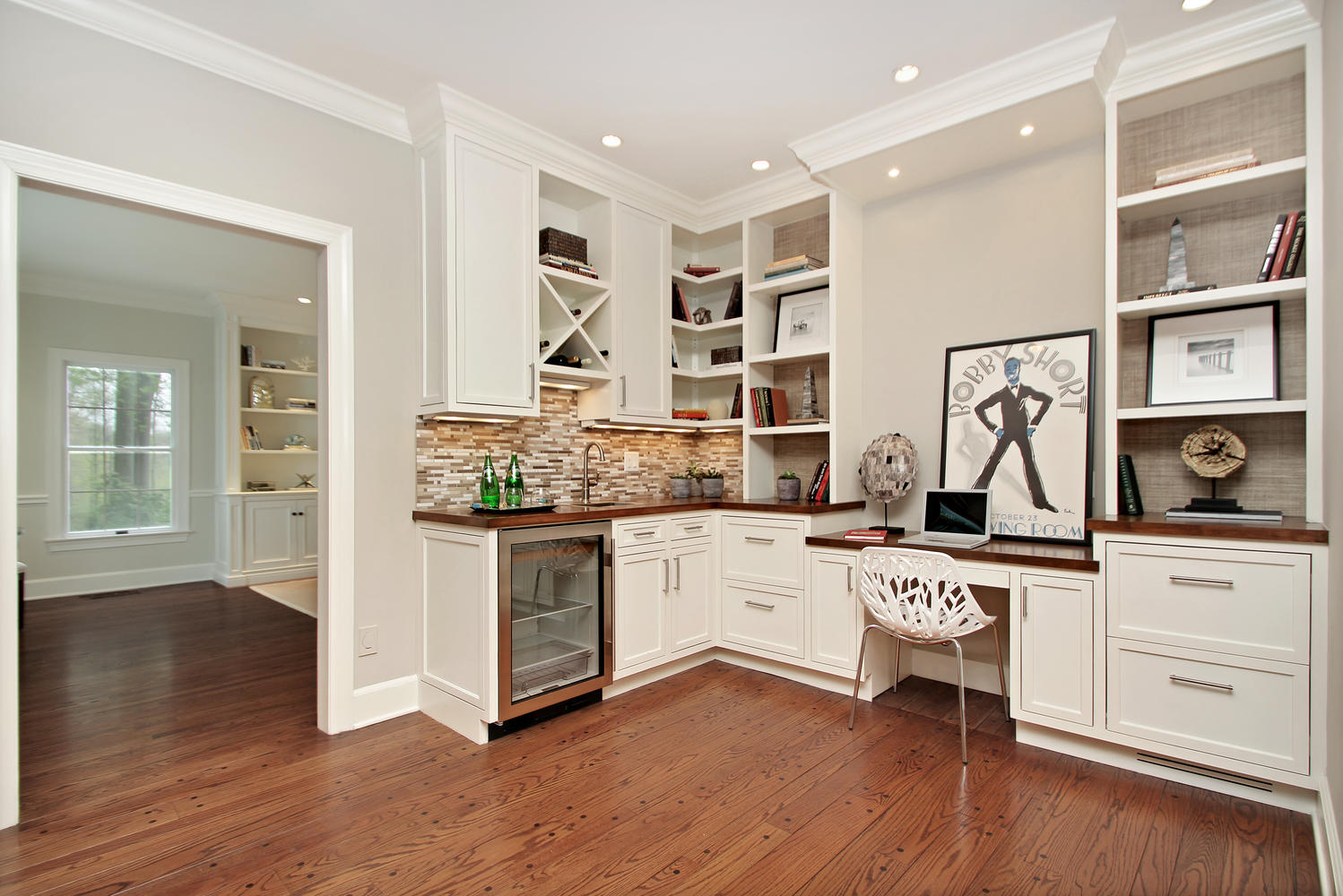 222 Marshall Ridge Road New Canaan, CT 06840 - Photo 9 of 49 a kitchen with stainless steel appliances granite countertop a stove and white cabinets with wooden floor
