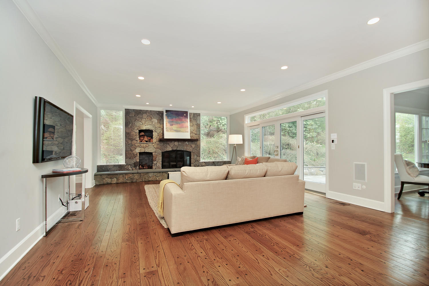 222 Marshall Ridge Road New Canaan, CT 06840 - Photo 10 of 49 a living room with furniture a fireplace and a flat screen tv