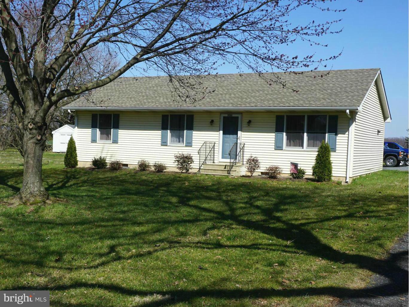 11629 Lynch Road Worton, MD 21678 - Photo 2 of 15 a front view of a house with a garden