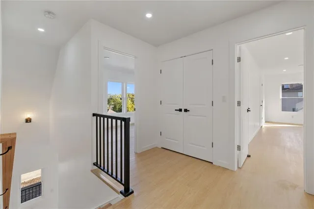 a view of a hallway with closet area
