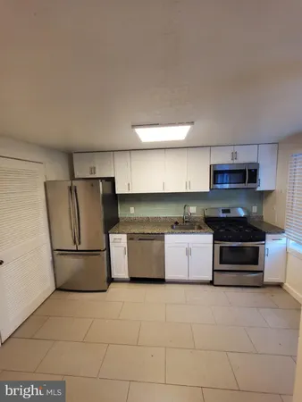 a view of a hallway with staircase
