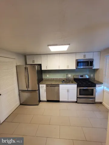 a view of a hallway with staircase