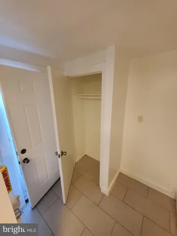 a view of balcony with wooden floor