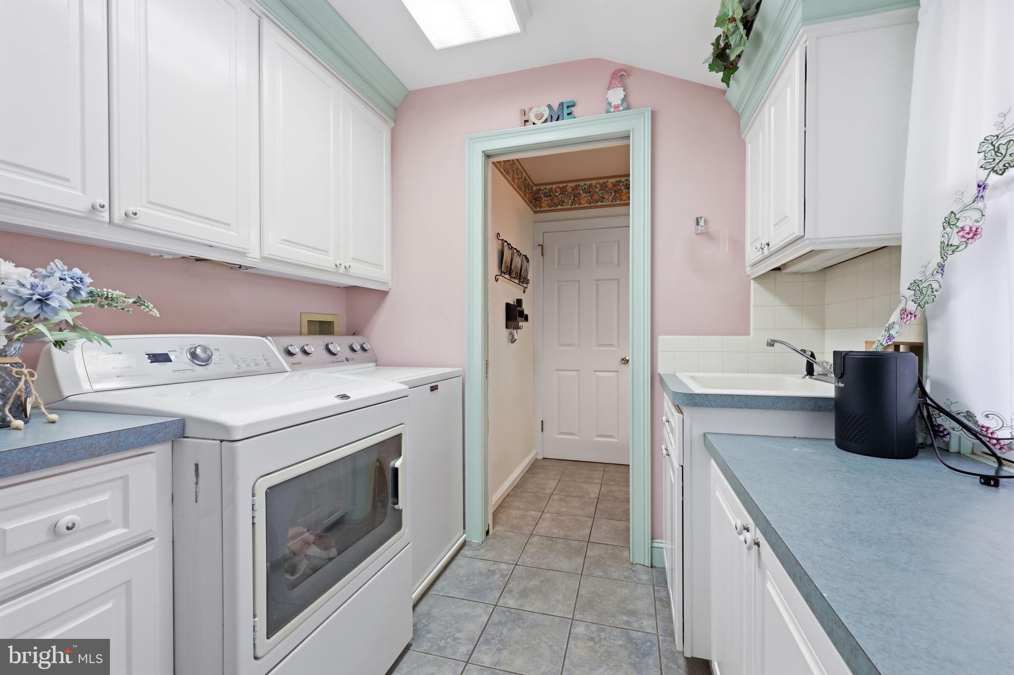 1011 Bristol Road Southampton, PA 18966 - Photo 30 of 35 Charming laundry nook with pastel hues.