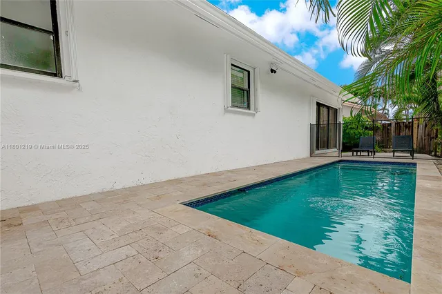 a view of a backyard with a garden