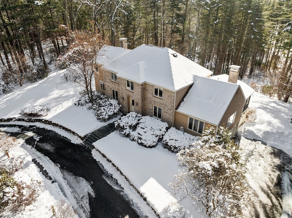 132 Williams Road Concord, MA 01742 - Photo 13 of 38 an aerial view of a house with yard and trees all around