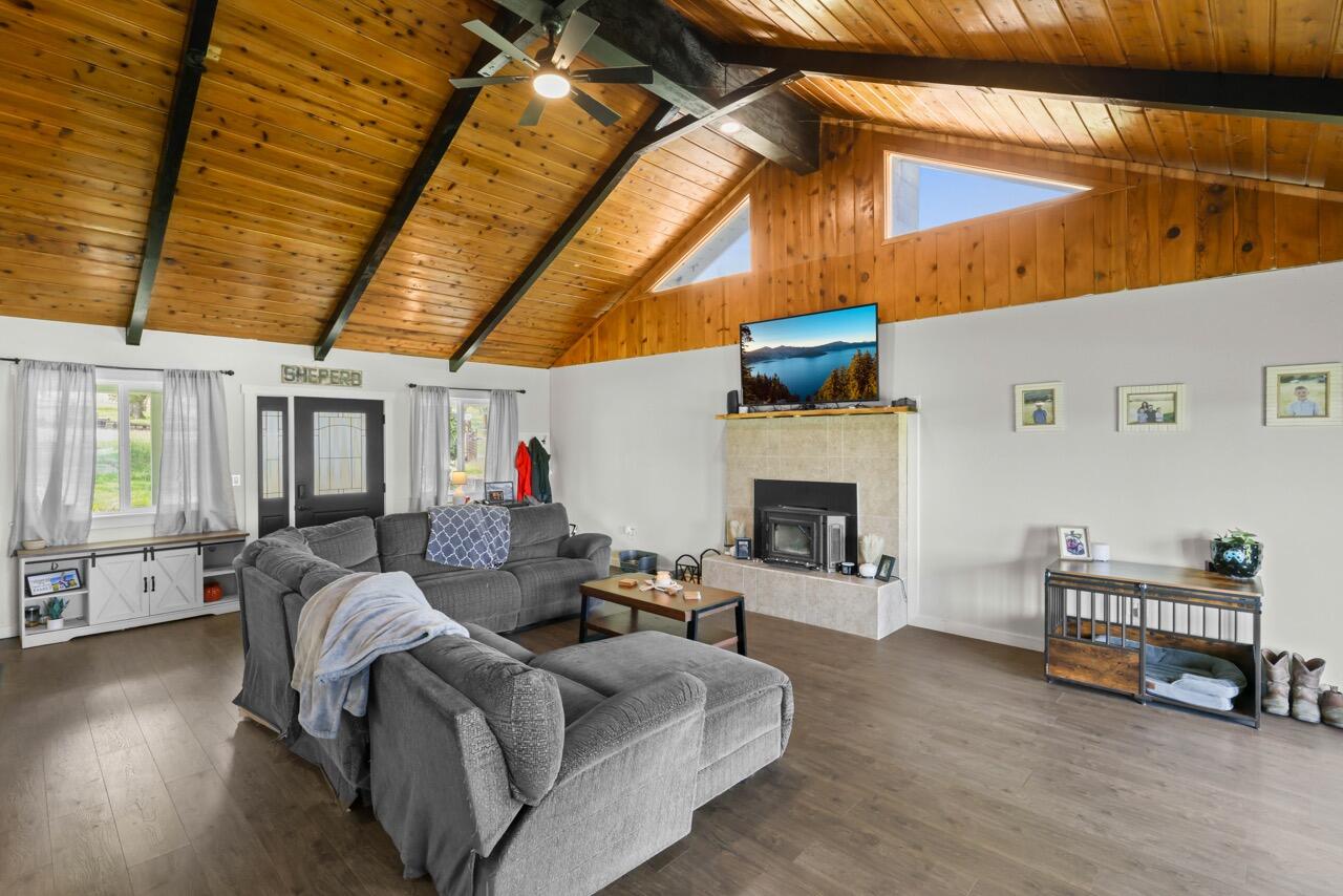 380 Greenleaf Drive Eagle Point, OR 97524 - Photo 13 of 31 a living room with furniture and a fireplace
