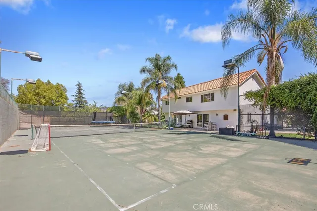 a view of a street with a building in the background