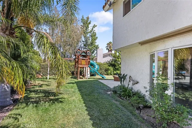 a view of a road with a building in the background