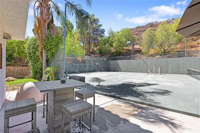 a view of yard with patio