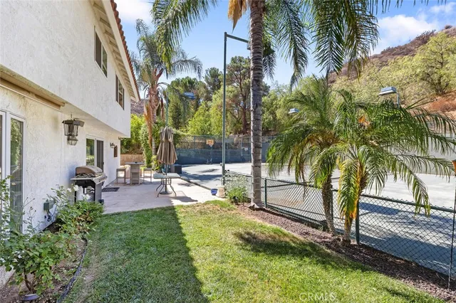 an aerial view of a house with a garden