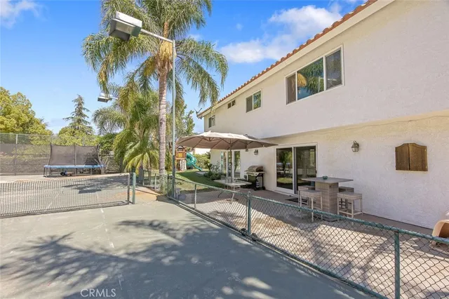 an aerial view of residential house with outdoor space