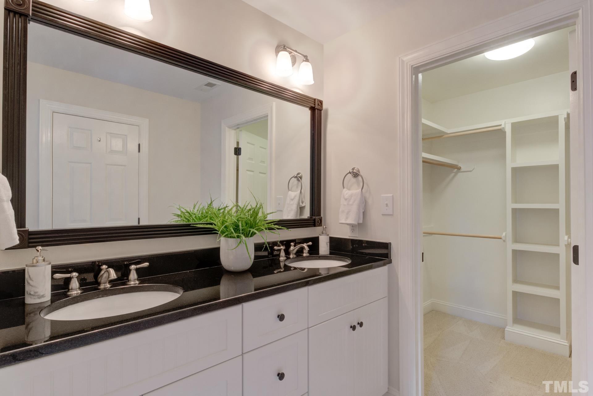 109 Ronsard Lane Cary, NC 27511 - Photo 17 of 26 a bathroom with a sink and a mirror