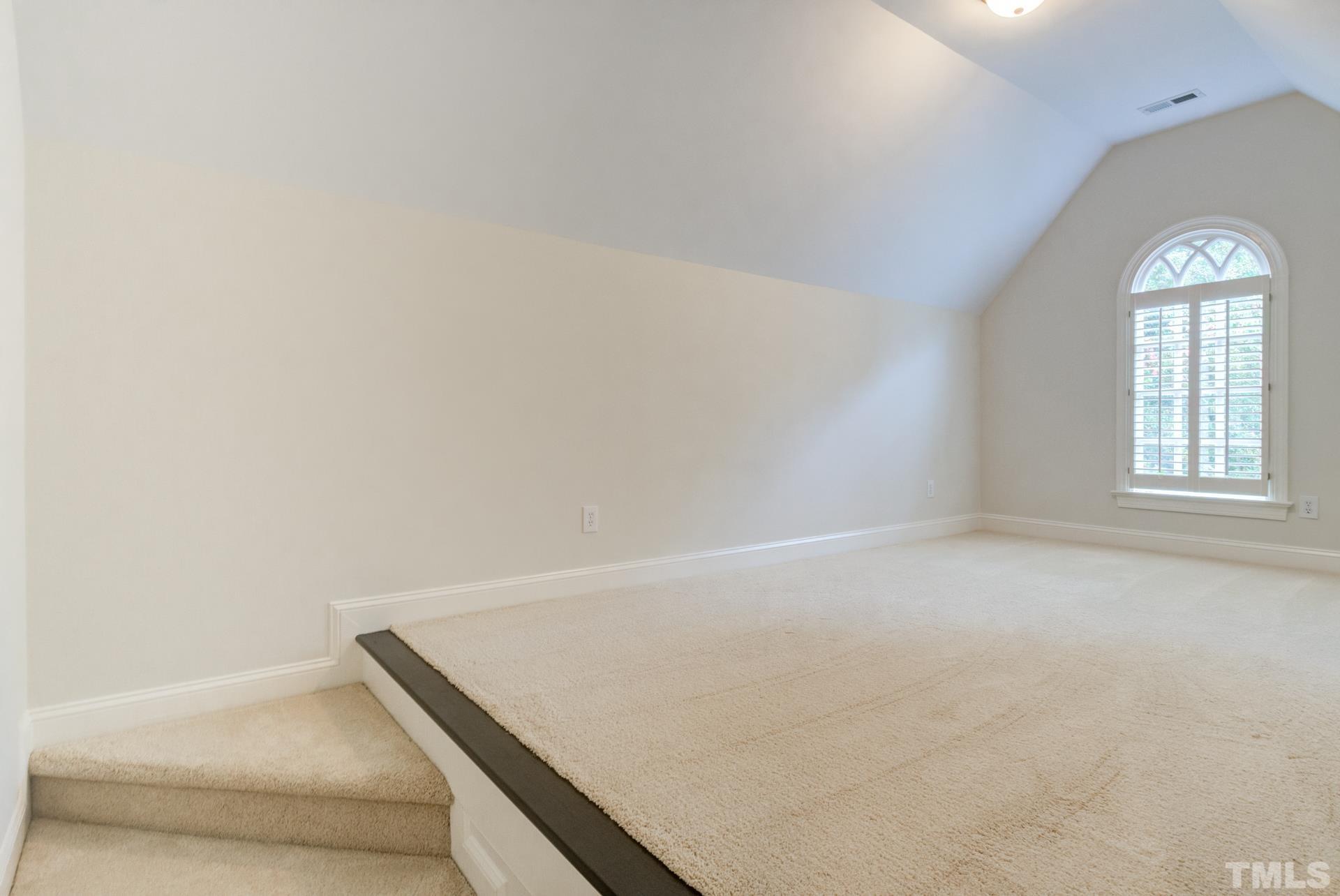 109 Ronsard Lane Cary, NC 27511 - Photo 23 of 26 an empty room with windows