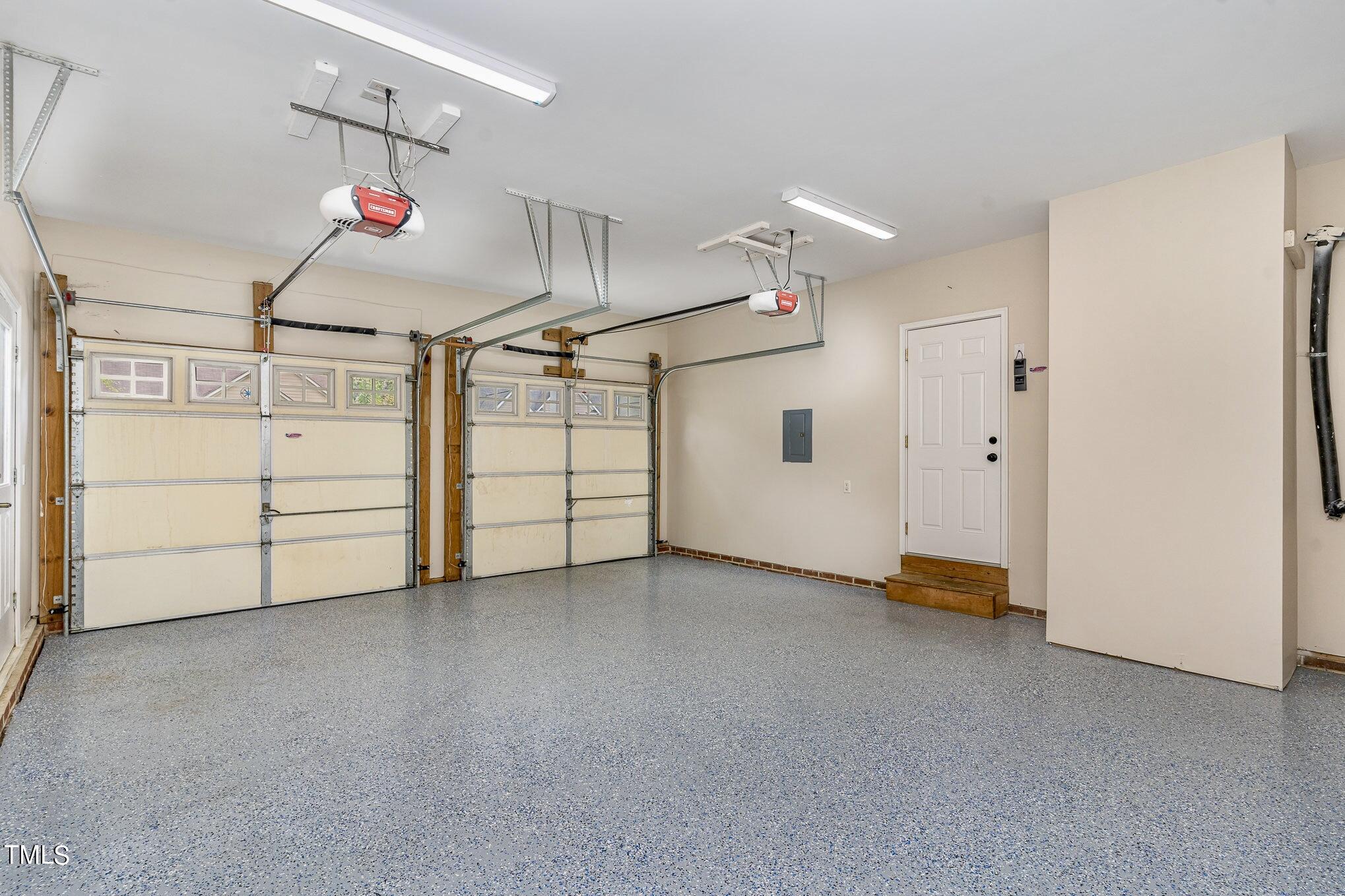 2204 Dunlin Lane Raleigh, NC 27614 - Photo 19 of 32 a view of a utility room with cabinet stairs and windows