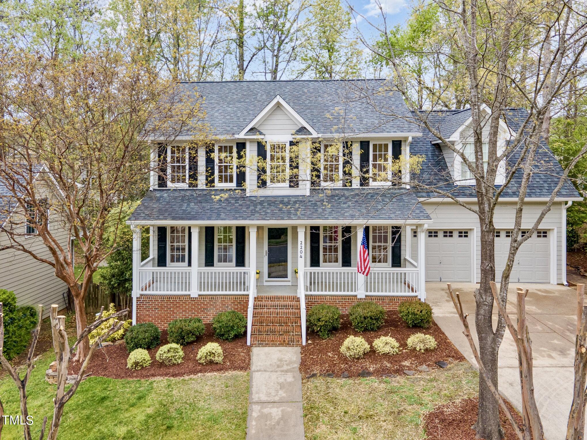 2204 Dunlin Lane Raleigh, NC 27614 - Photo 2 of 32 front view of a house with a yard