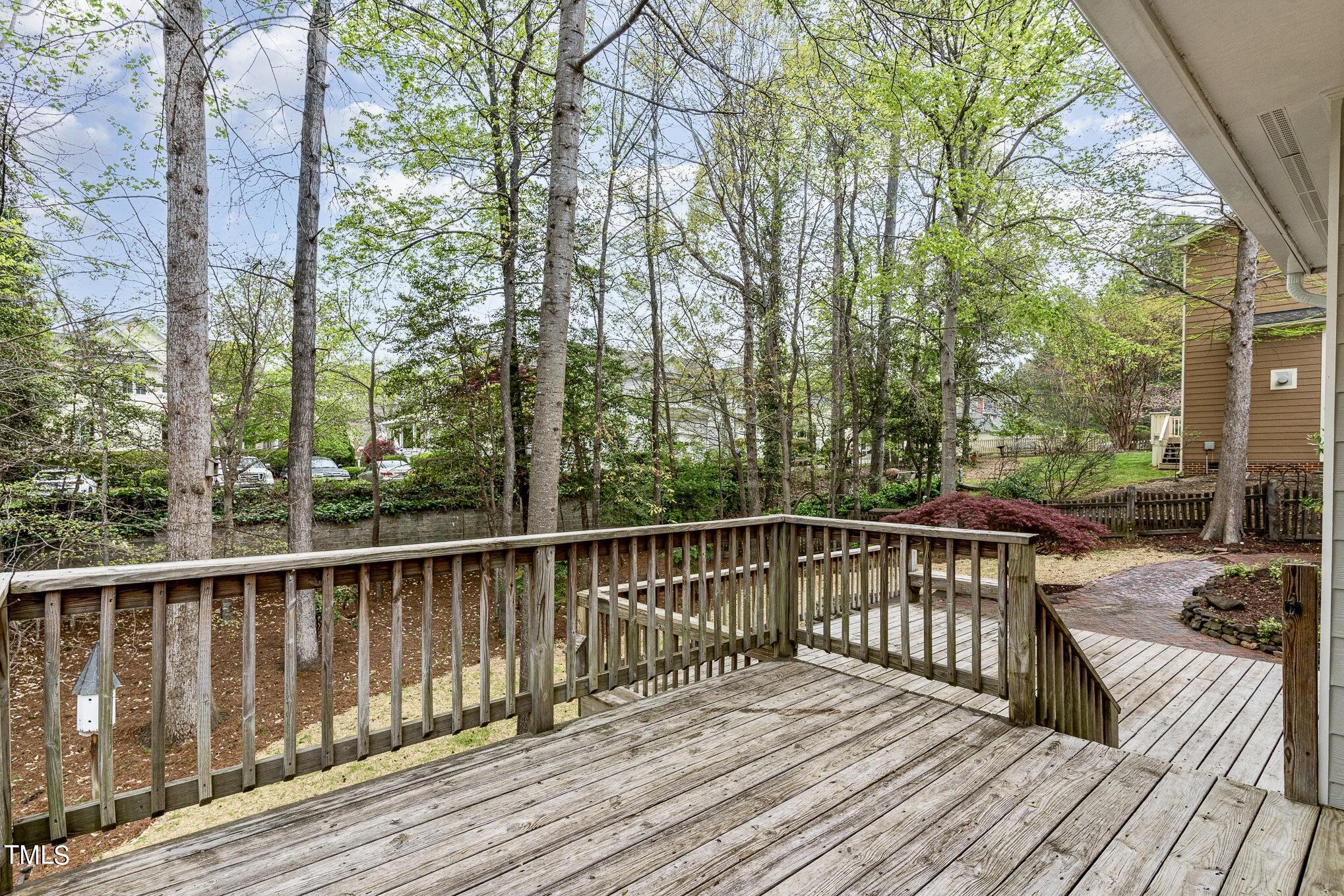 2204 Dunlin Lane Raleigh, NC 27614 - Photo 20 of 32 a view of balcony with wooden floor and fence