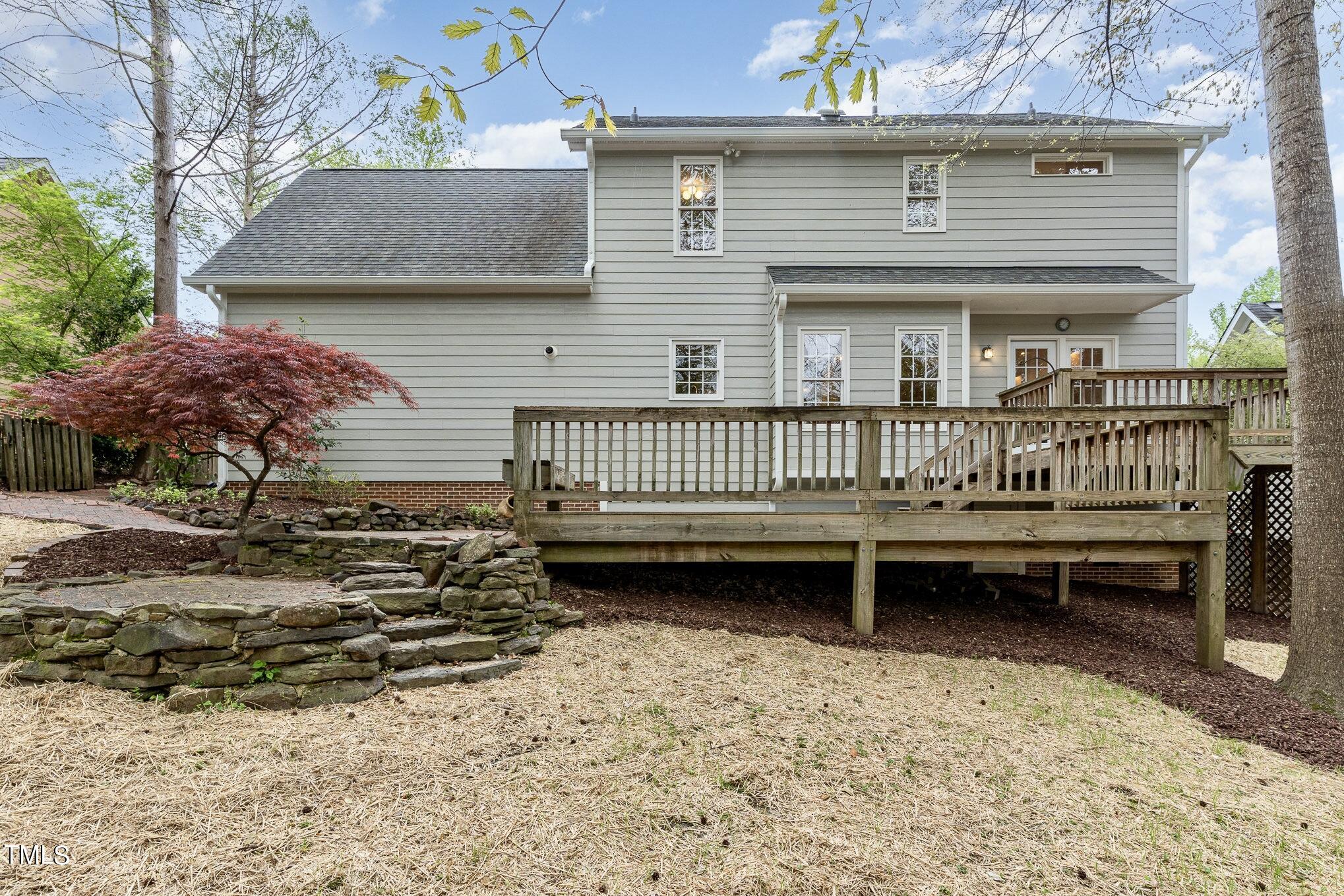 2204 Dunlin Lane Raleigh, NC 27614 - Photo 24 of 32 a view of a patio with a bench