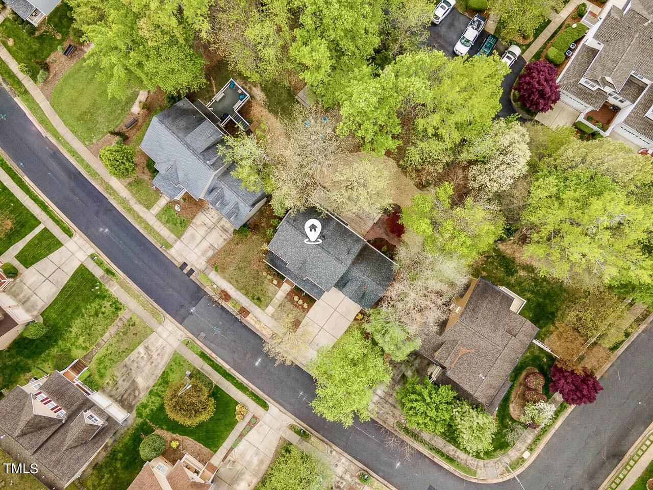 2204 Dunlin Lane Raleigh, NC 27614 - Photo 27 of 32 an aerial view of a house with a garden and swimming pool