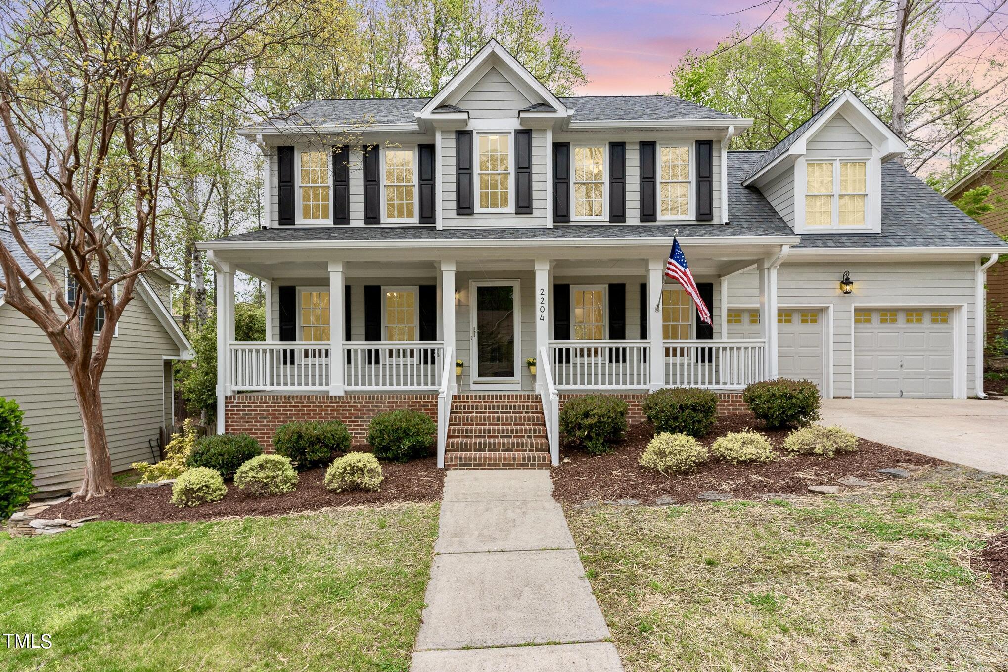 2204 Dunlin Lane Raleigh, NC 27614 - Photo 3 of 32 a front view of a house with a yard