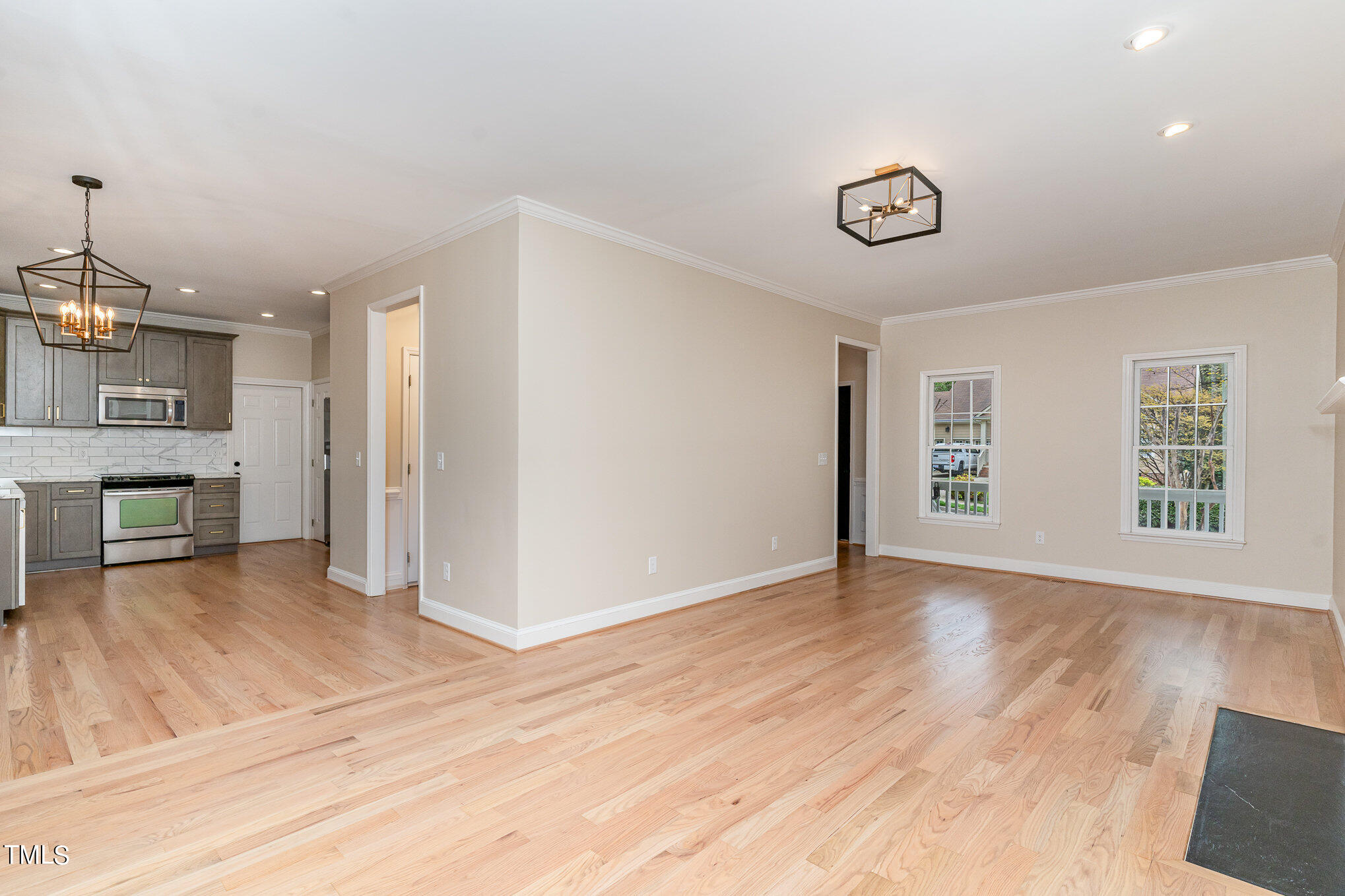 2204 Dunlin Lane Raleigh, NC 27614 - Photo 32 of 32 a view of livingroom with hardwood floor and kitchen space