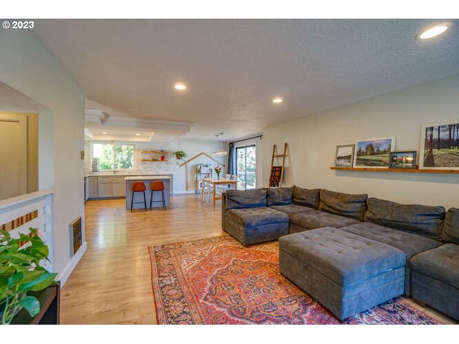 111 Northeast 19th Avenue Camas, WA 98607 - Photo 14 of 48 a living room with furniture and a wooden floor
