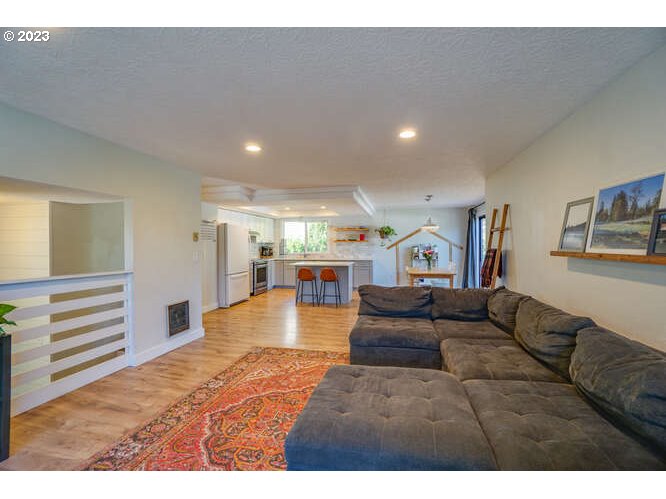 111 Northeast 19th Avenue Camas, WA 98607 - Photo 15 of 48 a living room with furniture and a wooden floor