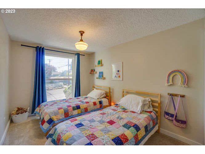 111 Northeast 19th Avenue Camas, WA 98607 - Photo 25 of 48 a bedroom with two beds and a window