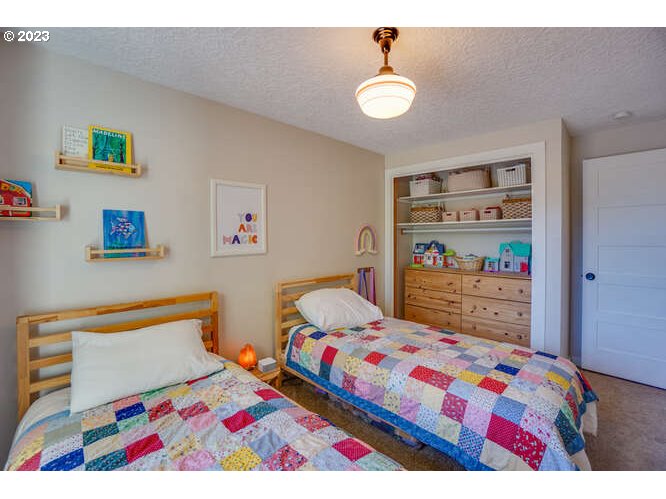 111 Northeast 19th Avenue Camas, WA 98607 - Photo 26 of 48 a bedroom that has two bed in it
