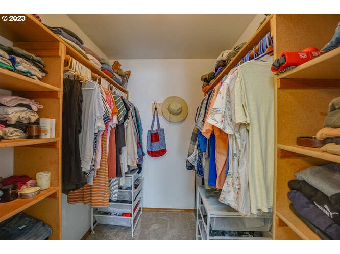 111 Northeast 19th Avenue Camas, WA 98607 - Photo 33 of 48 a view of walk in closet with clothes and shoes