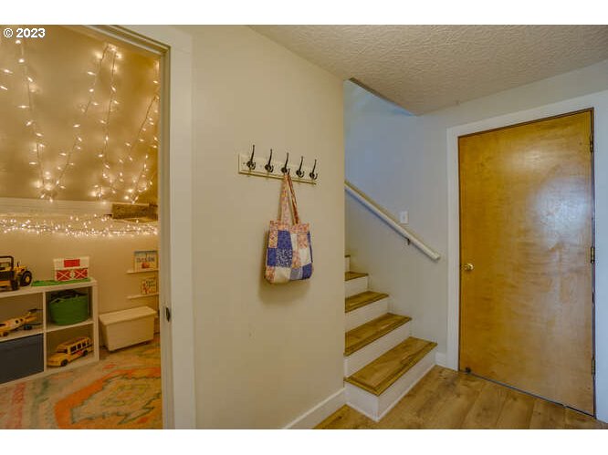 111 Northeast 19th Avenue Camas, WA 98607 - Photo 34 of 48 a view of entryway and hall with wooden floor