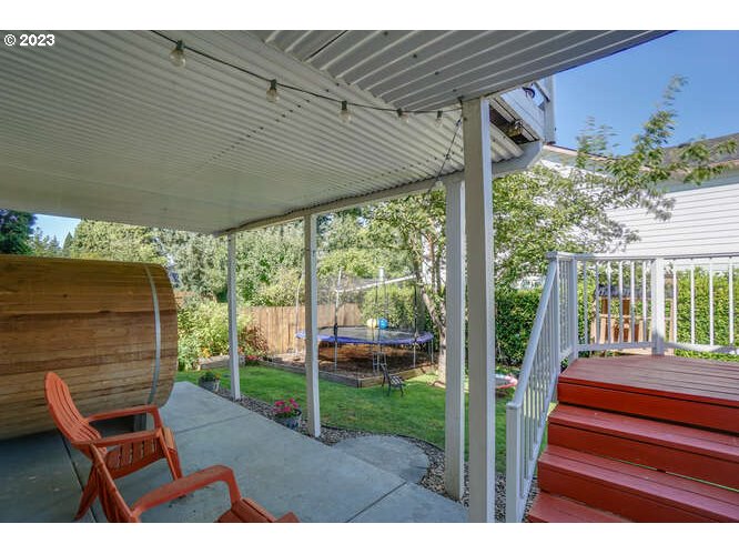 111 Northeast 19th Avenue Camas, WA 98607 - Photo 44 of 48 a backyard of a house with a fountain dining table and chairs