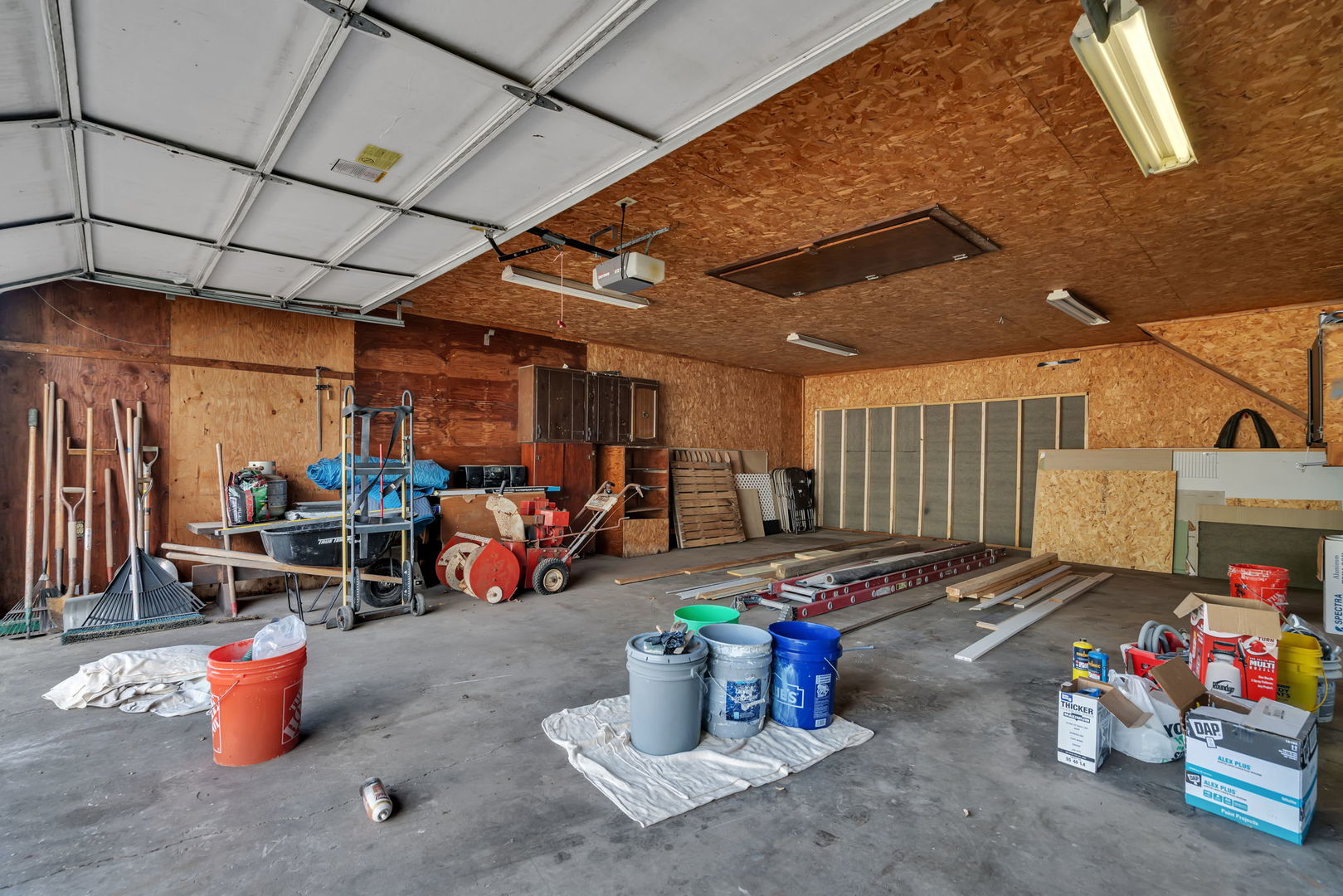 53 Duncan Drive Bourbonnais, IL 60914 - Photo 23 of 49 a view of a garage with parked cars