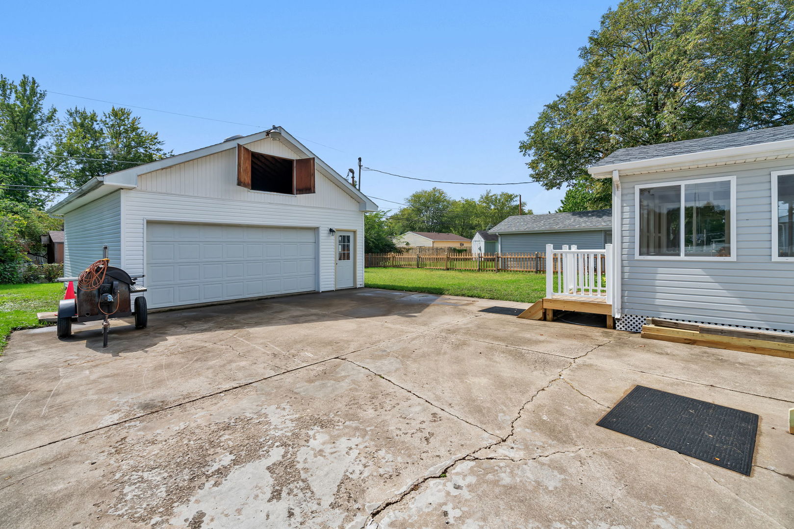 53 Duncan Drive Bourbonnais, IL 60914 - Photo 26 of 49 a view of a house with a patio and a yard