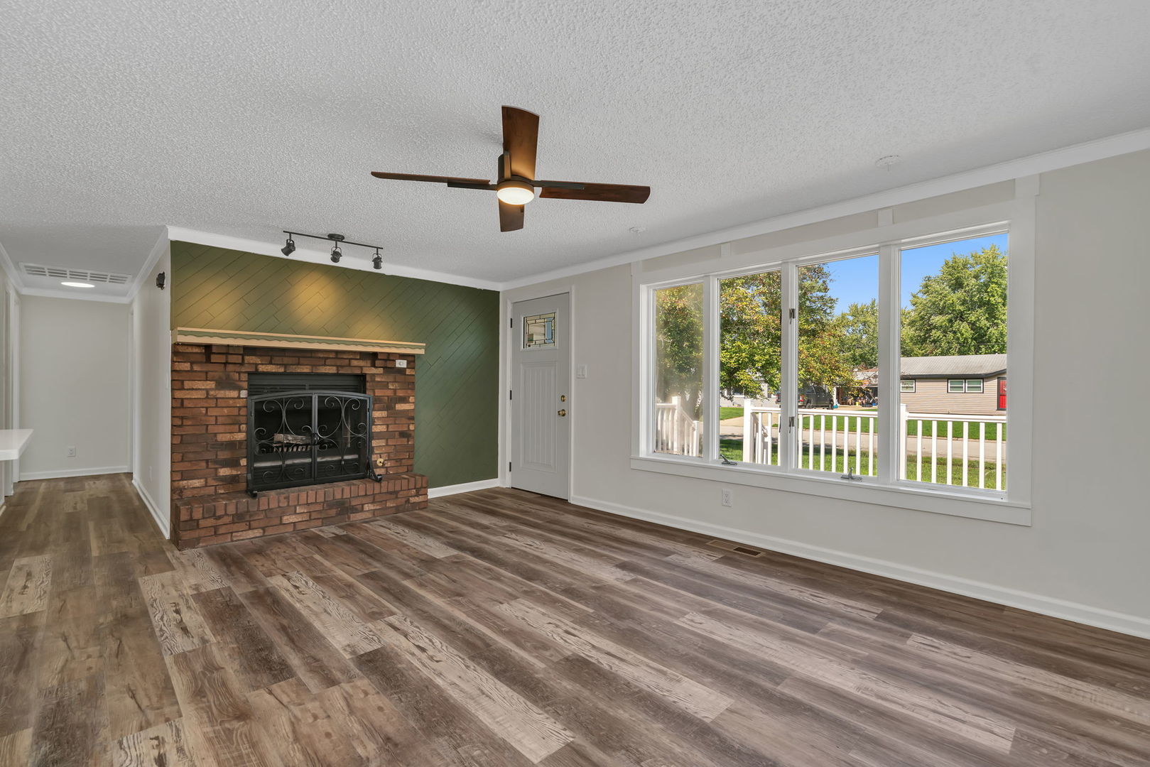 53 Duncan Drive Bourbonnais, IL 60914 - Photo 3 of 49 a view of an empty room with a fireplace and a window