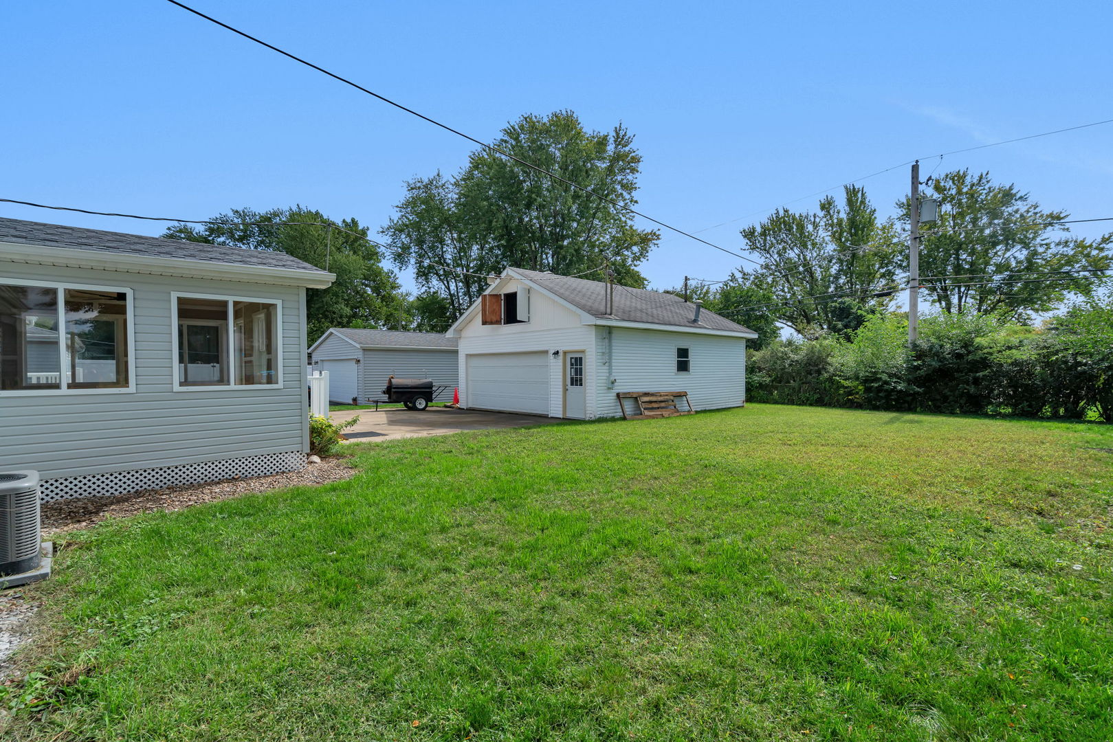 53 Duncan Drive Bourbonnais, IL 60914 - Photo 36 of 49 a house view with a garden space