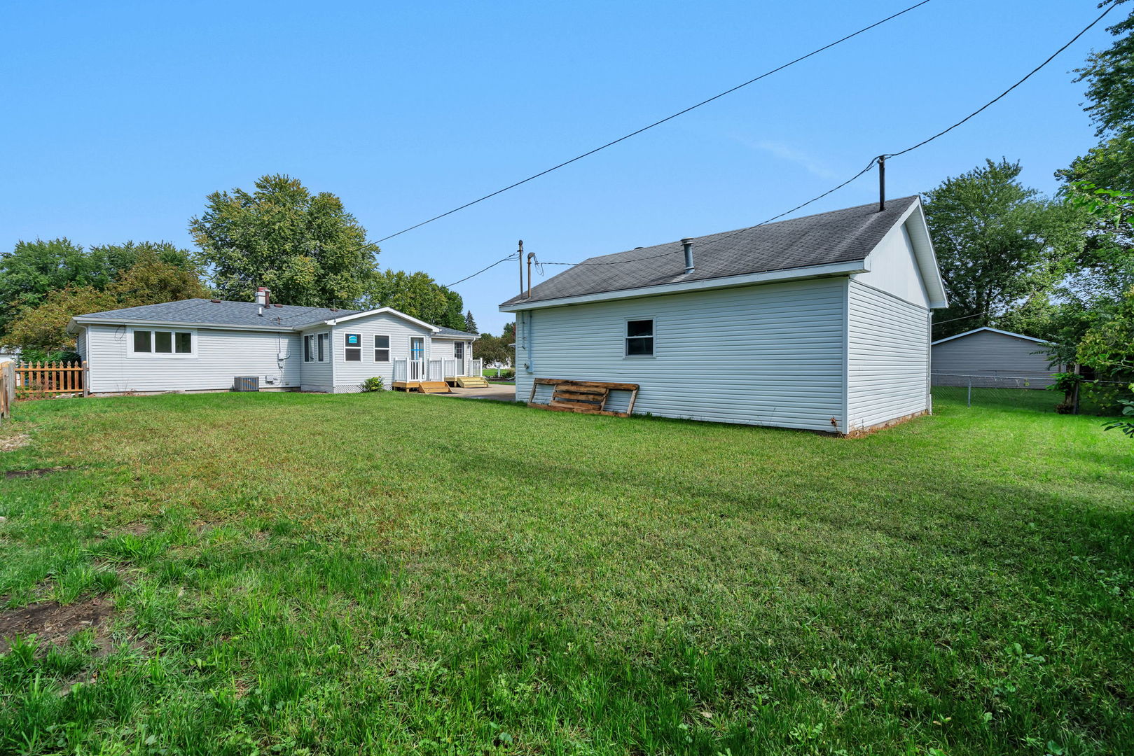 53 Duncan Drive Bourbonnais, IL 60914 - Photo 37 of 49 a house view with a garden space