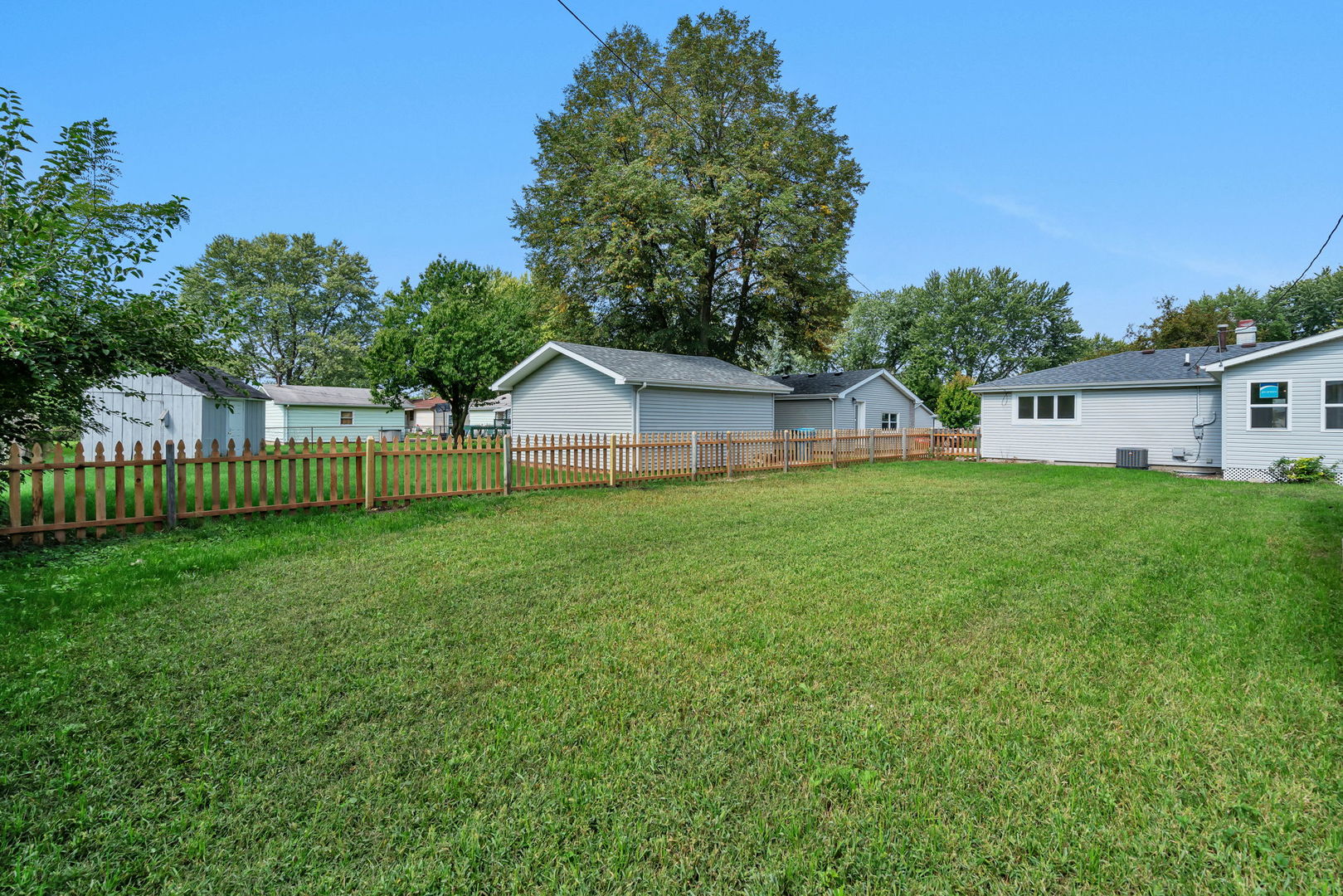 53 Duncan Drive Bourbonnais, IL 60914 - Photo 38 of 49 a view of a house with a yard and sitting area