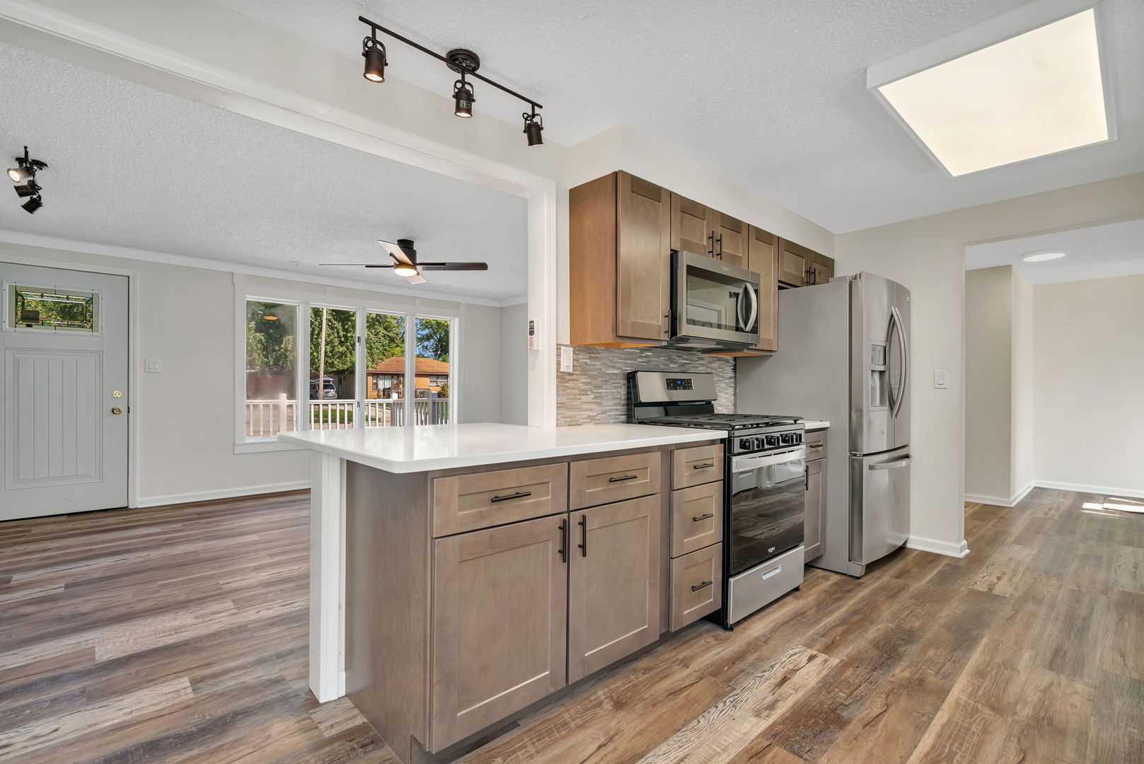 53 Duncan Drive Bourbonnais, IL 60914 - Photo 10 of 49 a kitchen with stainless steel appliances granite countertop a stove and a refrigerator