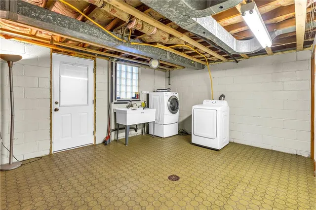a view of a room with wooden walls