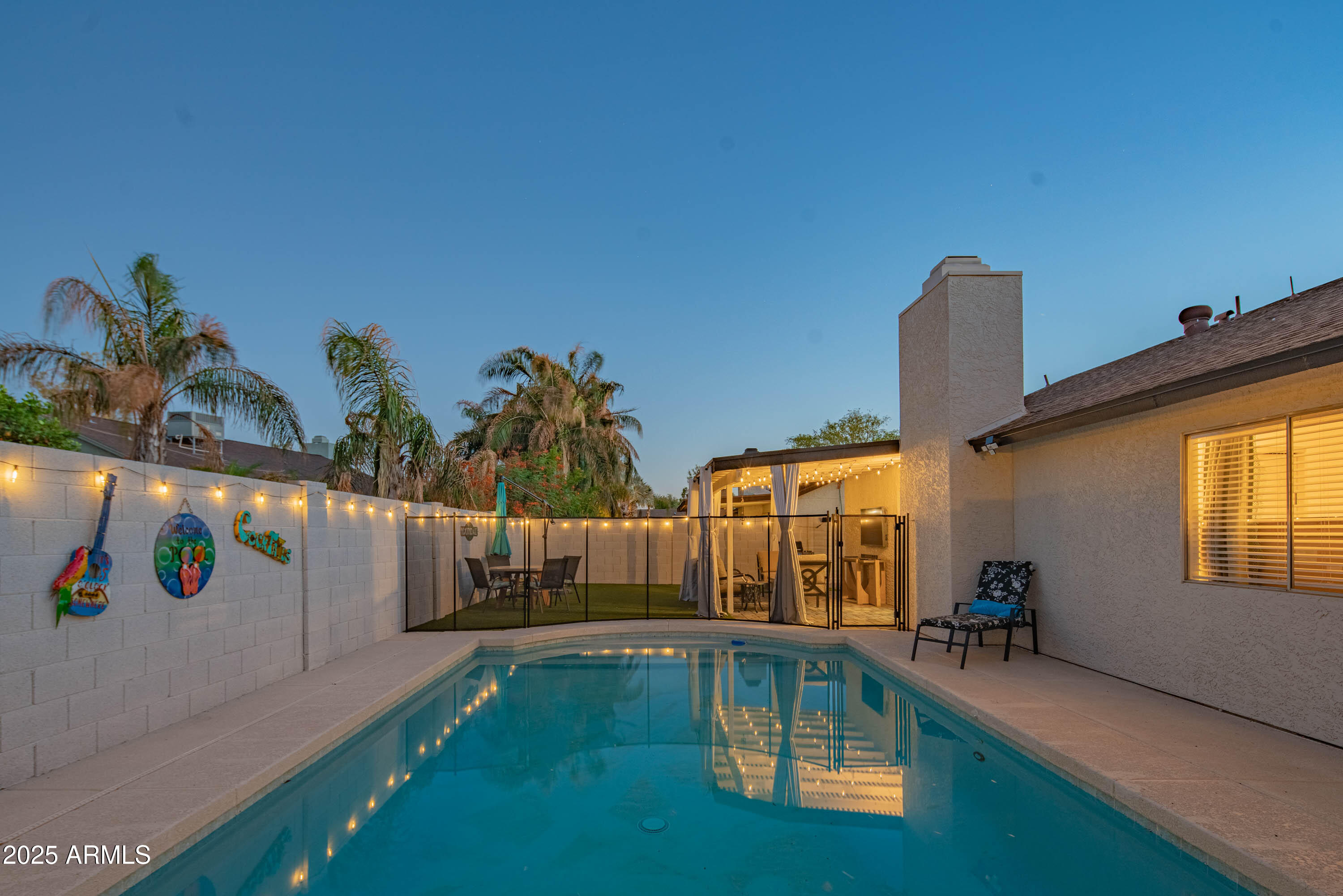 15641 North 63rd Street Scottsdale, AZ 85254 - Photo 20 of 32 a front view of a house with garden