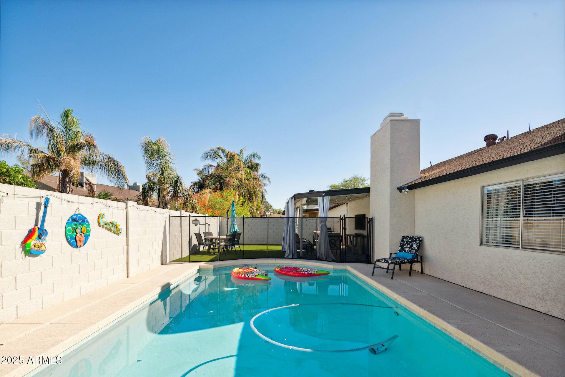 15641 North 63rd Street Scottsdale, AZ 85254 - Photo 32 of 32 a view of swimming pool with a patio