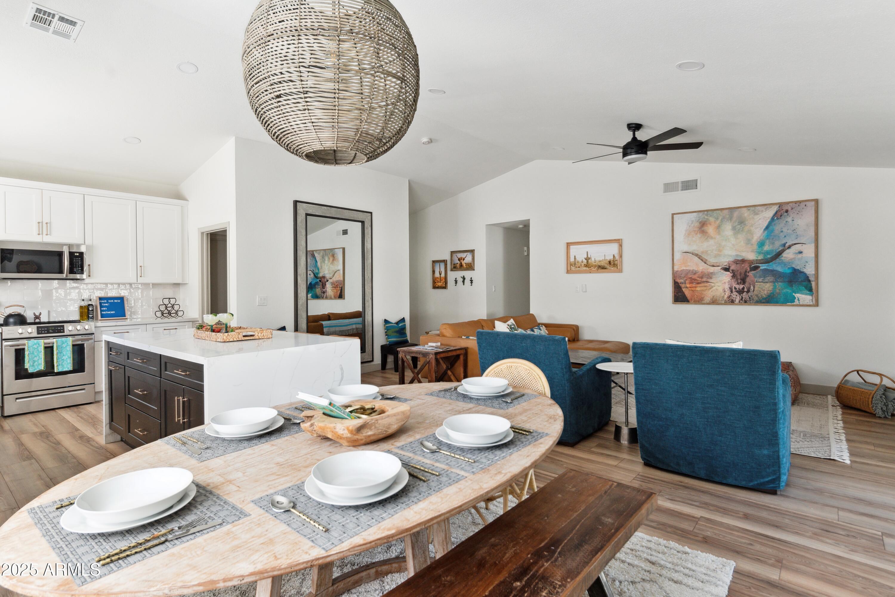 15641 North 63rd Street Scottsdale, AZ 85254 - Photo 7 of 32 a open dining room with furniture and window