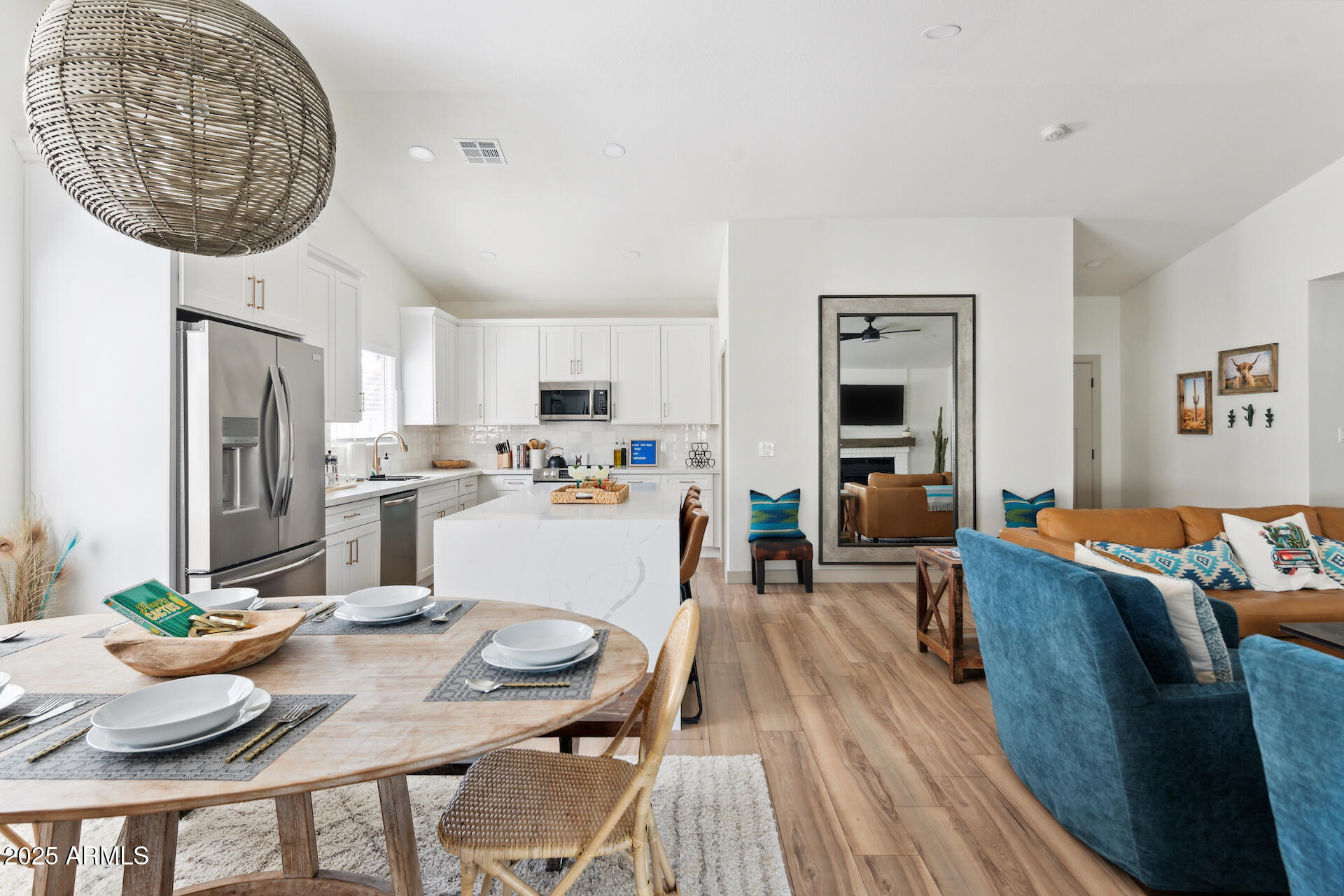 15641 North 63rd Street Scottsdale, AZ 85254 - Photo 8 of 32 a living room with stainless steel appliances furniture a dining table and kitchen view
