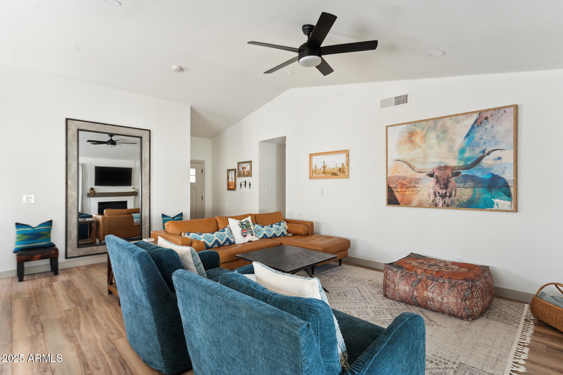 15641 North 63rd Street Scottsdale, AZ 85254 - Photo 10 of 32 a living room with furniture and a wooden floor
