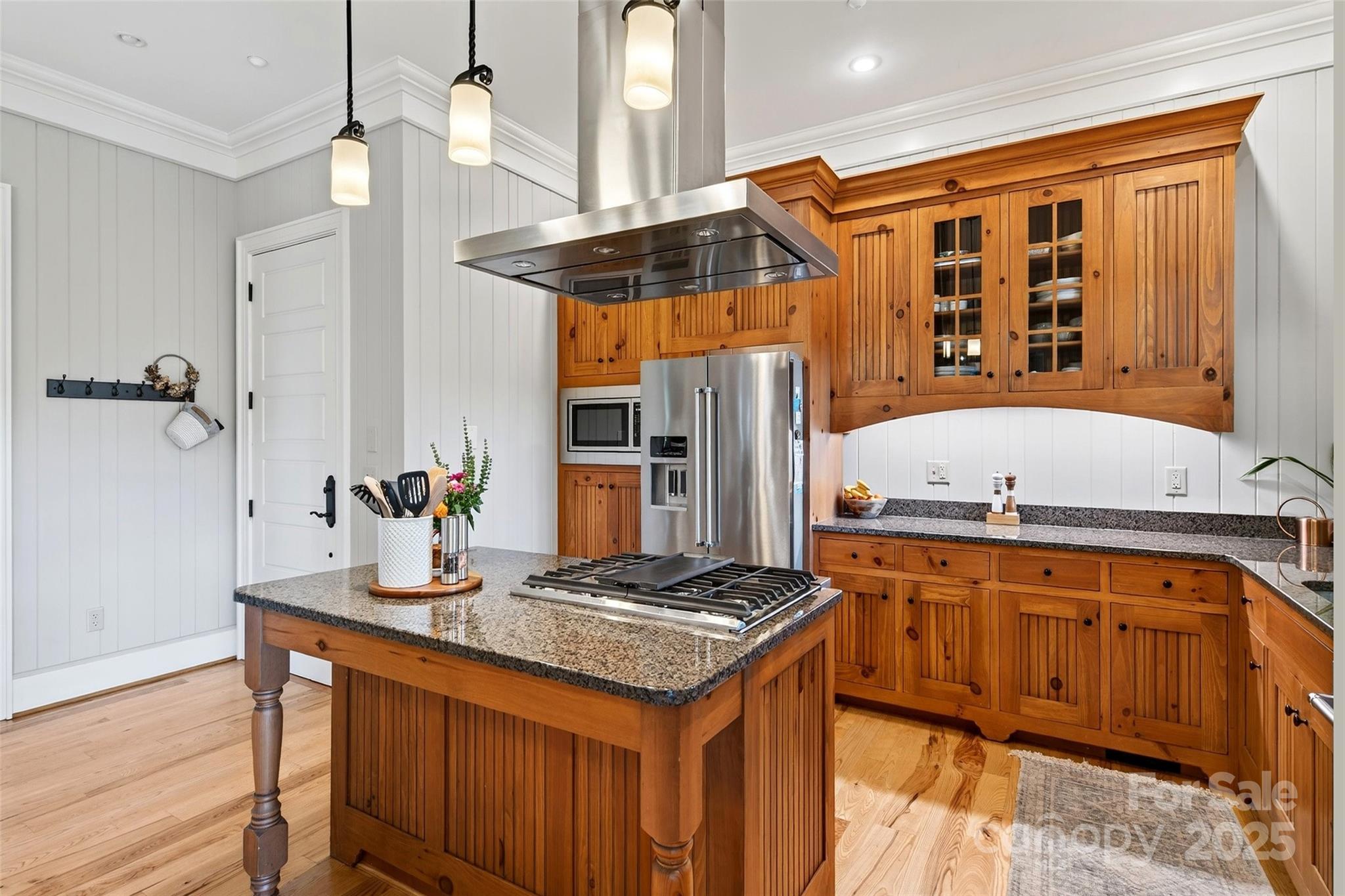 275 Clubhouse, Unit C202 Mill Spring, NC 28756 - Photo 15 of 48 a kitchen with a sink cabinets and wooden floor